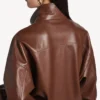 Blusón de cuello alto para mujer en color castaño Blusón de cuello alto para mujer en color castaño