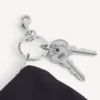 Bolsa con cremallera y colgante para hombre en negro