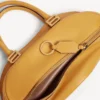 Bolso de bolos «Bolero» mini para mujer en color curry