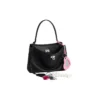 Bolso de mano pequeño Rodeo con efecto desgastado y un colgante «Negro» 7897792AA831000