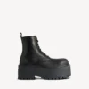 Botines de plataforma Strike para mujer en negro Botines de plataforma Strike para mujer en negro