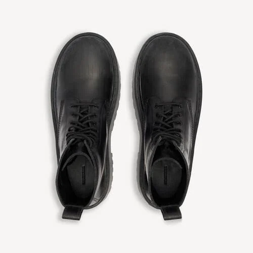 Botines de plataforma Strike para mujer en negro Botines de plataforma Strike para mujer en negro