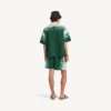 Pantalones cortos de hombre de corte holgado con estampado «extreme tie dye» en verde/blanco Pantalones cortos de hombre de corte holgado con estampado «extreme tie dye» en verde/blanco