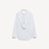 Camisa de mujer con espalda drapeada en blanco Camisa de mujer con espalda drapeada en blanco