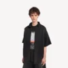 Camisa híbrida de manga corta de Denim «The Door» para hombre en negro Camisa híbrida de manga corta de Denim «The Door» para hombre en negro