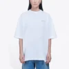 Camiseta blanca de manga corta holgada con logotipo de letras pequeñas 556104TYK289000
