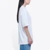 Camiseta blanca de manga corta holgada con logotipo de letras pequeñas 556104TYK289000