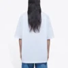 Camiseta blanca de manga corta holgada con logotipo de letras pequeñas 556104TYK289000