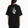 Camiseta de manga corta con estampado «Drip Peace» de la colección SS21, corte amplio, color negro 641655TKVA11012