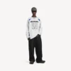 Camiseta de manga larga oversize para hombre de Balenciaga | Colaboración con la NBA en blanco/multicolor Camiseta de manga larga oversize para hombre de Balenciaga | Colaboración con la NBA en blanco/multicolor