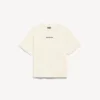 Camiseta de mujer Balenciaga con diseño trasero y corte medio en color crema