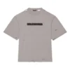 Camiseta unisex de manga corta, cuello redondo con estampado de letras en color liso, gris 661715TKVD58174