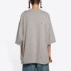 Camiseta unisex de manga corta, cuello redondo con estampado de letras en color liso, gris 661715TKVD58174