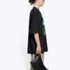 Camiseta unisex negra de manga corta con estampado retro y tejido liso, colección SS21, talla grande 641614TJVH61000