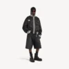 Chaqueta Coach de Balenciaga para hombre | Colaboración con la NBA en color negro Chaqueta Coach de Balenciaga para hombre | Colaboración con la NBA en color negro