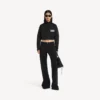Chaqueta de chándal corta para mujer en negro Chaqueta de chándal corta para mujer en negro