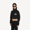 Chaqueta de chándal corta para mujer en negro Chaqueta de chándal corta para mujer en negro