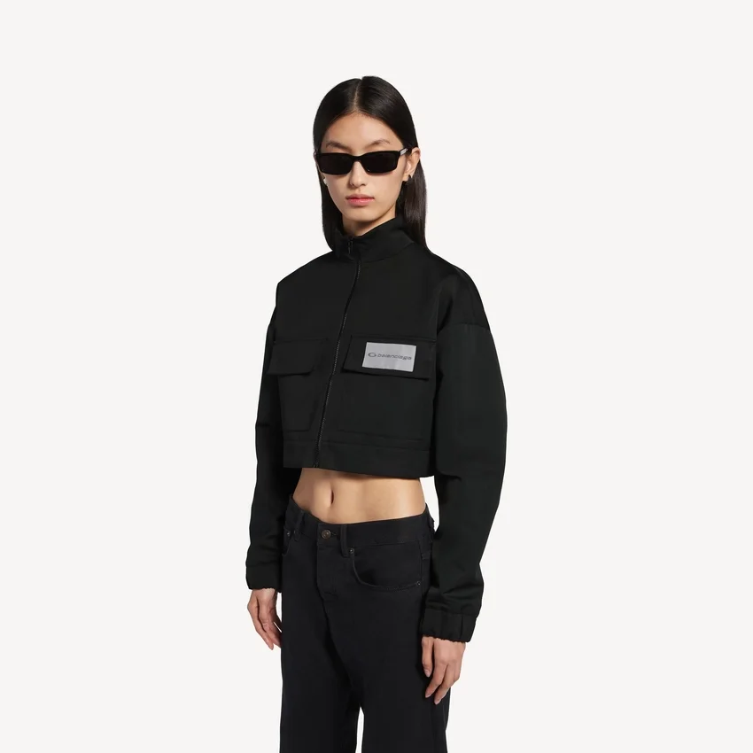 Chaqueta de chándal corta para mujer en negro Chaqueta de chándal corta para mujer en negro