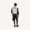 Chaqueta universitaria de hombre Balenciaga | Colaboración con la NBA en color marfil Chaqueta universitaria de hombre Balenciaga | Colaboración con la NBA en color marfil