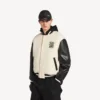 Chaqueta universitaria de hombre Balenciaga | Colaboración con la NBA en color marfil Chaqueta universitaria de hombre Balenciaga | Colaboración con la NBA en color marfil