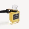 Colgante con frasco de perfume en miniatura en color negro Colgante con frasco de perfume en miniatura en color negro