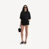 Falda-pantalón mini entallada para mujer en negro Falda-pantalón mini entallada para mujer en negro