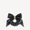 Goma para el pelo Clemence XL para mujer en negro/dorado