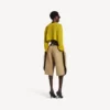 Jersey corto de cuello redondo para mujer en amarillo oscuro Jersey corto de cuello redondo para mujer en amarillo oscuro