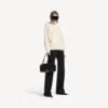 Jersey de cuello alto para mujer, con diseño «del revés», en blanco roto Jersey de cuello alto para mujer, con diseño «del revés», en blanco roto