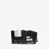 Monedero tipo clutch «Chips» en negro