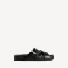 Mules con cinturón para hombre en negro Mules con cinturón para hombre en negro