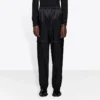 Pantalón Track de nailon con cremallera «Black» 621435TIO541000