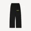 Pantalones de chándal holgados de hombre con estampado de spray desordenado en negro Pantalones de chándal holgados de hombre con estampado de spray desordenado en negro