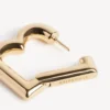Pendientes de a para mujer en oro brillante Pendientes de a para mujer en oro brillante