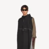 Poncho técnico para hombre en negro Poncho técnico para hombre en negro