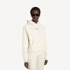 Sudadera con capucha Balenciaga para mujer, corte medio, en color crema Sudadera con capucha Balenciaga para mujer, corte medio, en color crema