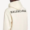 Sudadera con capucha Balenciaga para mujer, corte medio, en color crema Sudadera con capucha Balenciaga para mujer, corte medio, en color crema