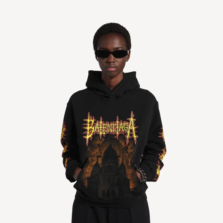 Sudadera con capucha Balenciaga Sacra Cœur de corte medio para mujer, en color negro Sudadera con capucha Balenciaga Sacra Cœur de corte medio para mujer, en color negro