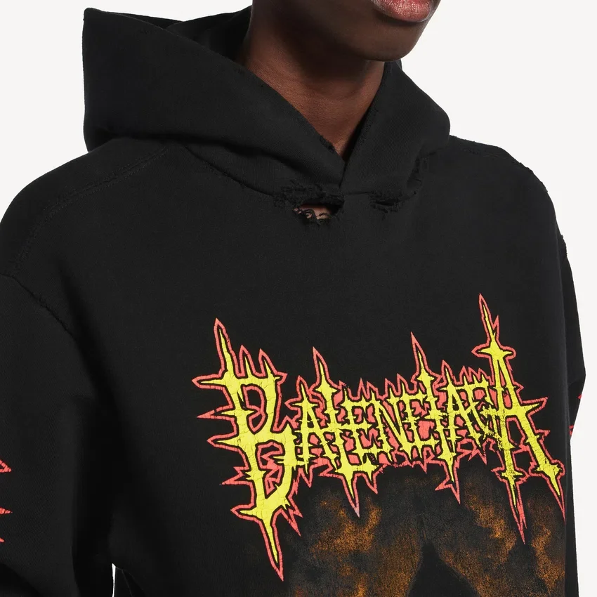 Sudadera con capucha Balenciaga Sacra Cœur de corte medio para mujer, en color negro Sudadera con capucha Balenciaga Sacra Cœur de corte medio para mujer, en color negro