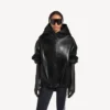 Sudadera con capucha holgada para mujer en negro Sudadera con capucha holgada para mujer en negro