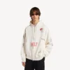 Sudadera con capucha oversize para hombre con estampado de tatuajes y cremallera, en color crema Sudadera con capucha oversize para hombre con estampado de tatuajes y cremallera, en color crema