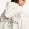 Sudadera con capucha oversize para hombre con estampado de tatuajes y cremallera, en color crema Sudadera con capucha oversize para hombre con estampado de tatuajes y cremallera, en color crema
