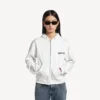Sudadera con capucha y cremallera de corte regular «Salon de Couture» para mujer, en color blanco Sudadera con capucha y cremallera de corte regular «Salon de Couture» para mujer, en color blanco