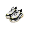 Triple S «Negro-Amarillo» 524039W09OM1023