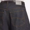 Vaqueros de corte curvo para hombre en índigo sin tratar Vaqueros de corte curvo para hombre en índigo sin tratar