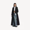 Vaqueros holgados de mujer con entrepierna baja en azul vintage desgastado Vaqueros holgados de mujer con entrepierna baja en azul vintage desgastado